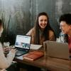 three adult students studying together